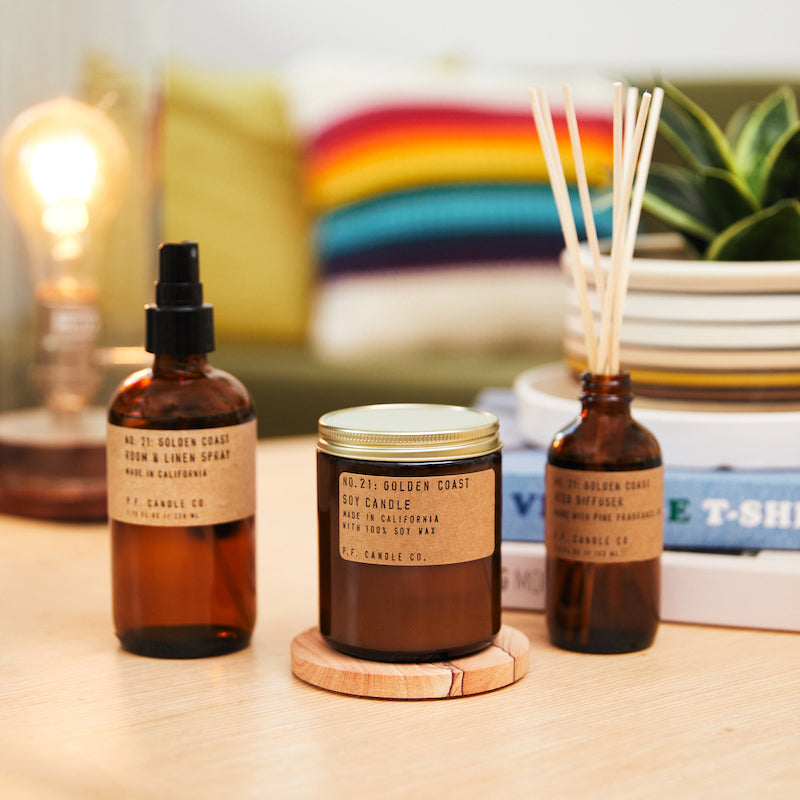 P.F. Candle Co. Golden Coast - Scent Family - Shop the collection available as standard cande, incense sticks, reed diffuser, and room & linen spray