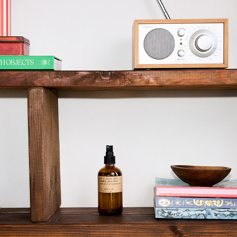 P.F. Candle Co. Golden Coast Room & Linen Spray - Lifestyle - Big Sur magic, wild sage baking in the sun, the rumble of waves and rocks. Eucalyptus, sea salt, redwood, and palo santo.