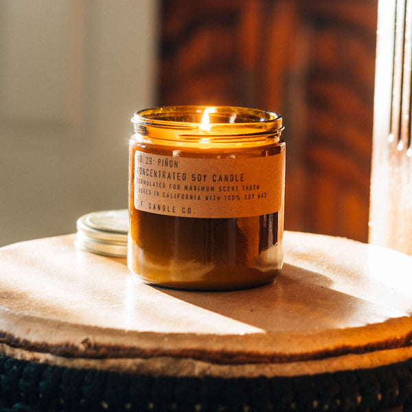 P.F. Candle Co. Piñon Large Concentrated Candle - Lifestyle - Winters in the Southwest, lingering bonfires, wool jackets in rotation. Piñon logs, cedar, and vanilla.