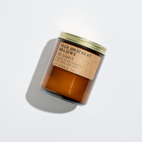 P.F. Candle Co. Your Apartment for Wallows Standard Candle - Product - Hand-poured into apothecary inspired amber jars with our signature kraft label and a brass lid.