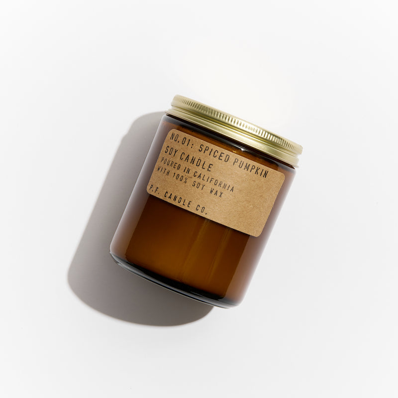 P.F. Candle Co. Spiced Pumpkin Standard Candle - Product - Hand-poured into apothecary inspired amber jars with our signature kraft label and a brass lid.