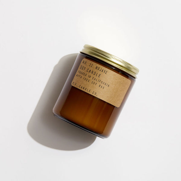 P.F. Candle Co. Mojave Standard Candle - Product - Hand-poured into apothecary inspired amber jars with our signature kraft label and a brass lid.
