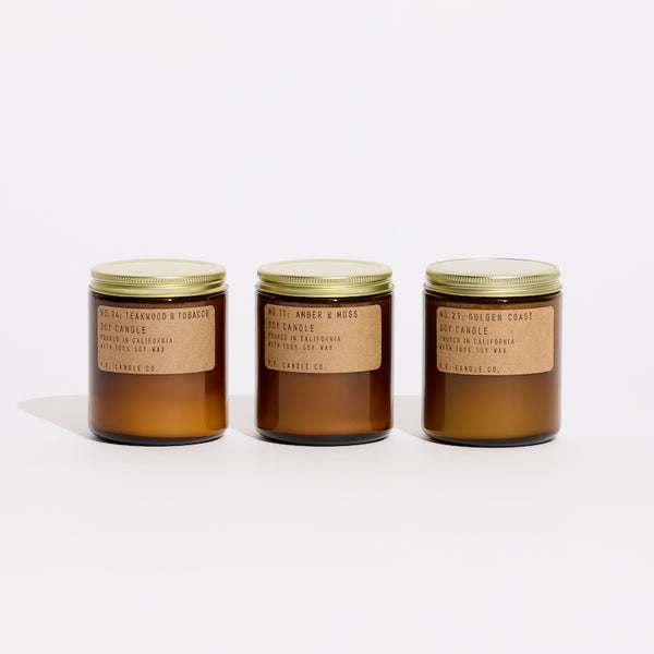 P.F. Candle Co. Tried & True Bundle - Product - Save 15%! This collection includes Teakwood & Tobacco, Amber & Moss, and Golden Coast in our best-selling 7.2 oz Standard Candle size.