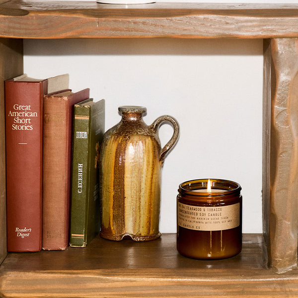 P.F. Candle Co. Teakwood & Tobacco Reed Diffuser - Lifestyle - The one that started it all. Some call it the boyfriend scent, we call it the O.G. Leather, teak, and orange.