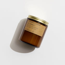 P.F. Candle Co. Saltwater Jasmine Standard Candle - Product - Hand-poured into apothecary inspired amber jars with our signature kraft label and a brass lid.