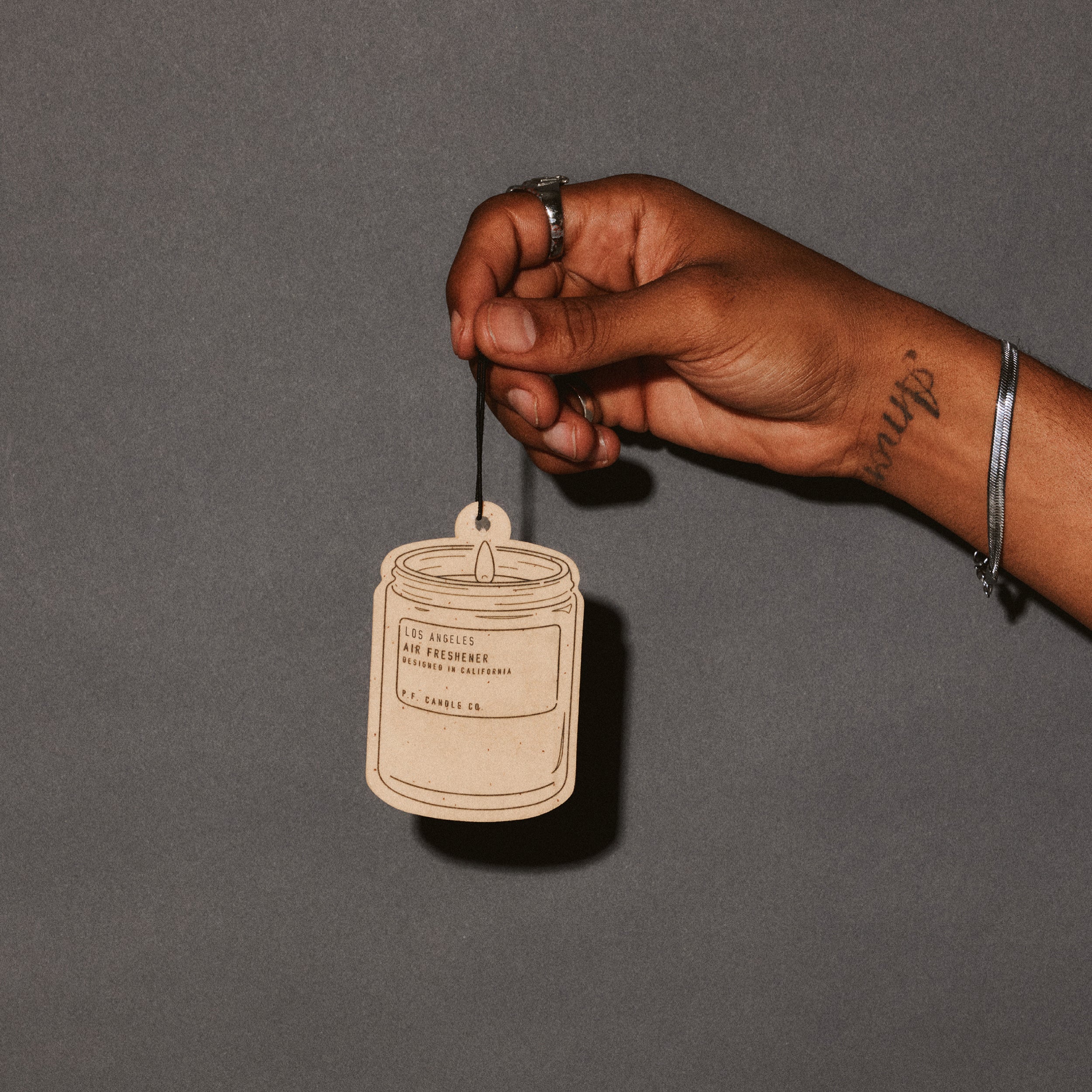 los angeles air freshener with hand