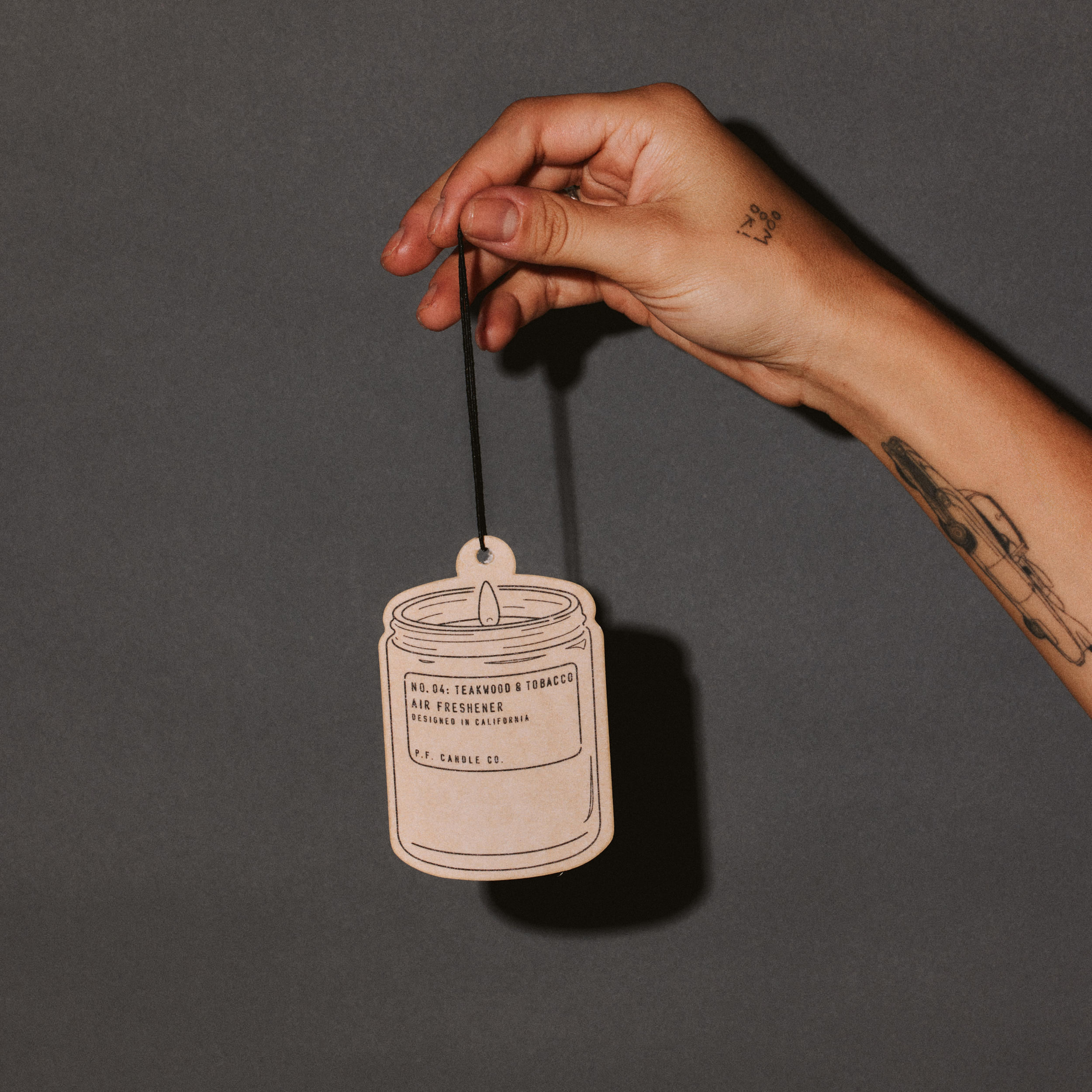 teakwood tobacco air freshener with hand