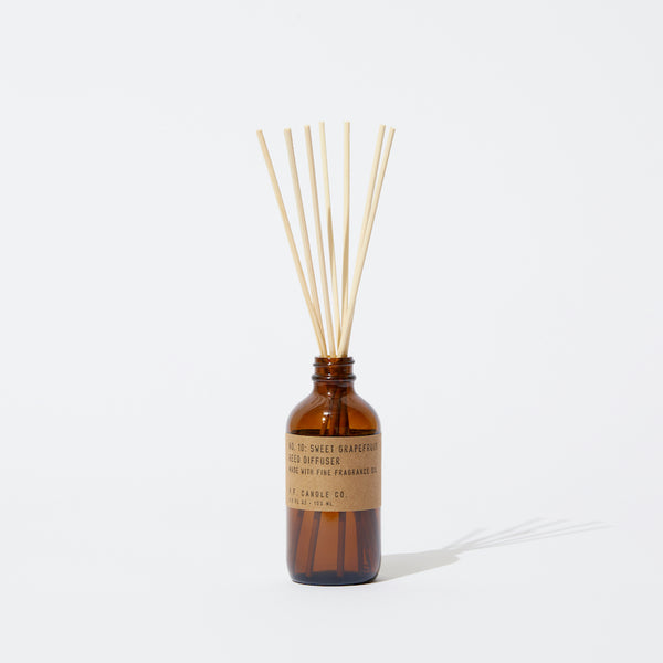 P.F. Candle Co. LA - Sweet Grapefruit Classic 3.5 fl oz Reed Diffuser - Our Reed Diffusers come in apothecary-inspired amber glass bottles with our signature kraft label and rattan reeds. Low-maintenance scent throw, all day long - no match necessary.