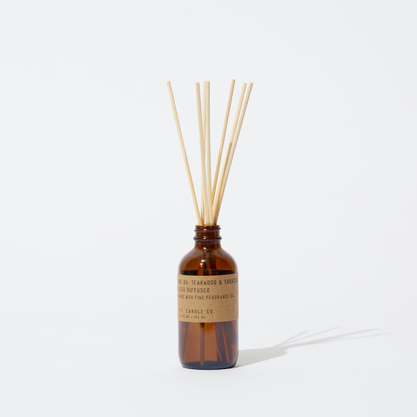 P.F. Candle Co. Teakwood & Tobacco Reed Diffuser - Product - Packaged in apothecary-inspired amber glass bottles with our signature kraft label and rattan reeds. Low-maintenance scent throw, all day long - no match necessary.